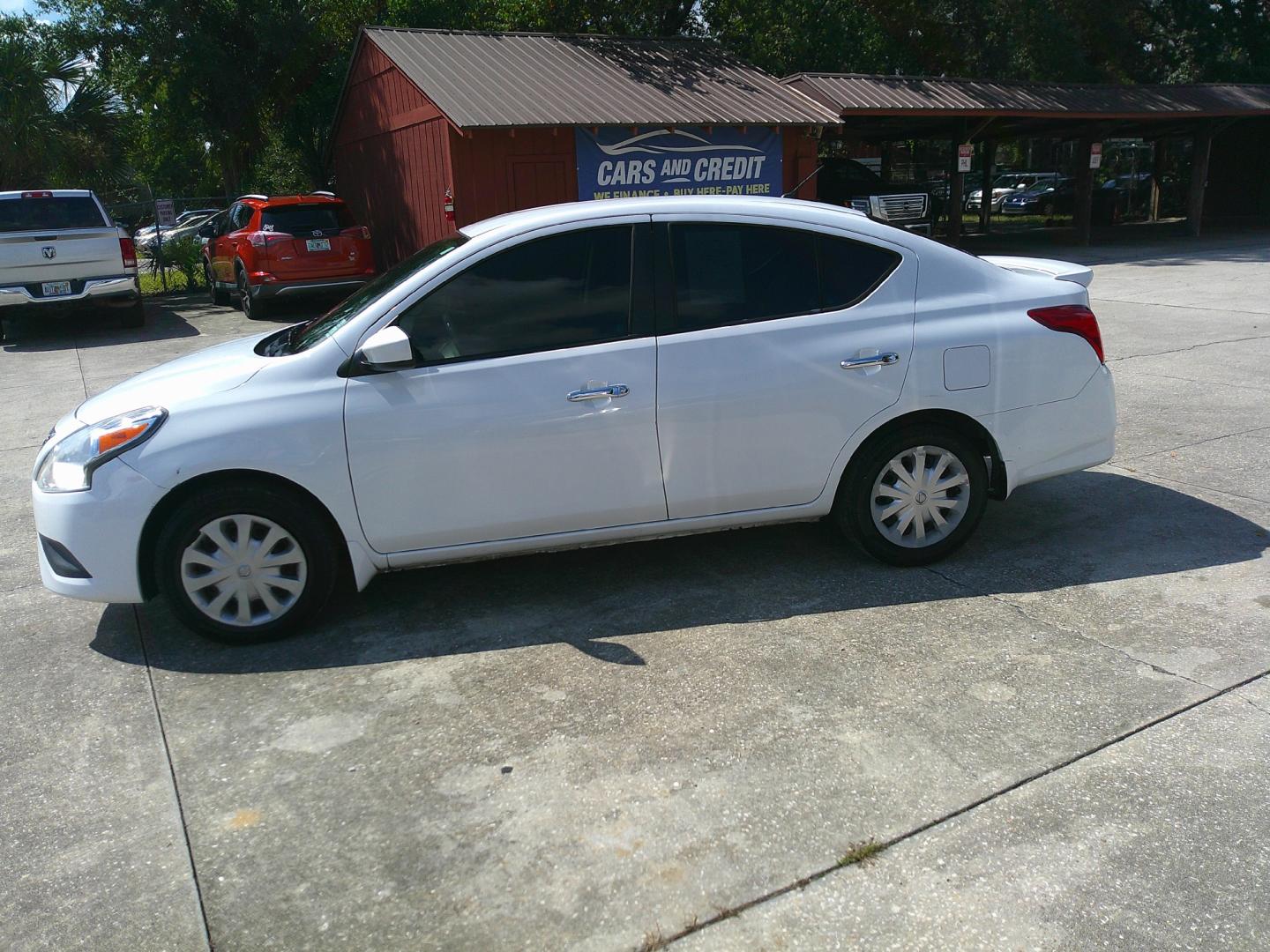 2016 WHITE NISSAN VERSA S; SL; SV (3N1CN7AP4GL) , located at 1200 Cassat Avenue, Jacksonville, FL, 32205, (904) 695-1885, 30.302404, -81.731033 - Photo#1